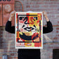 Person holding OBEY 3-FACE COLLAGE 18x24 Signed Offset Lithograph Set third one